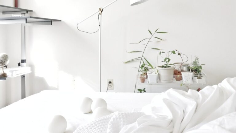 white bed unsplash